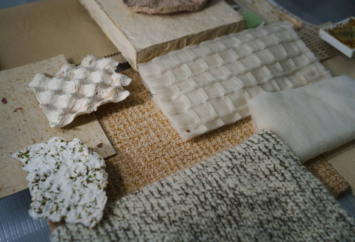 Comparison chart showing nylon, olefin, and wool Berber carpet fibers with durability, stain resistance, and cost ratings