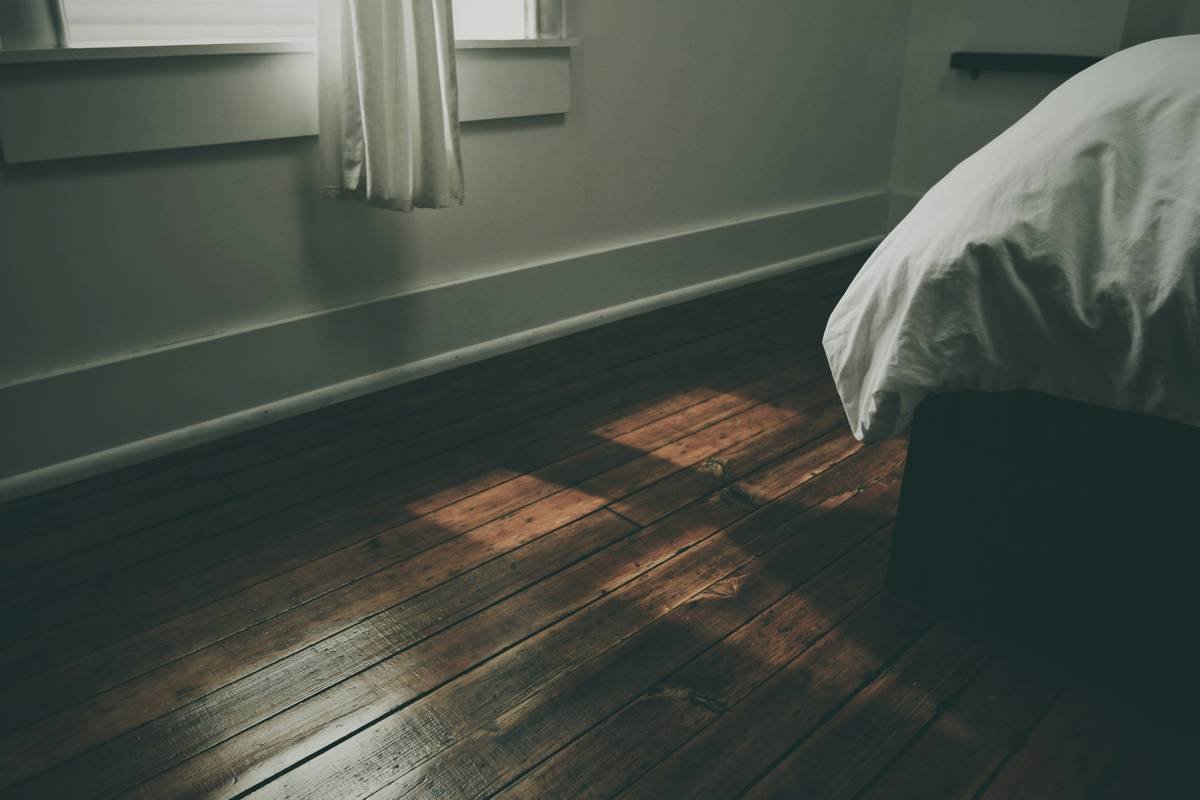 Side-by-side comparison of berber carpet vs hardwood flooring in family room is berber carpet outdated