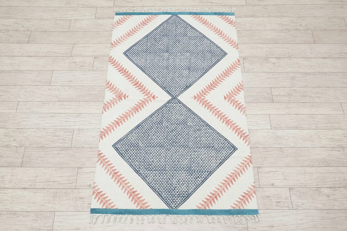 Close-up of berber carpet diamond pattern showing multi-level loop texture