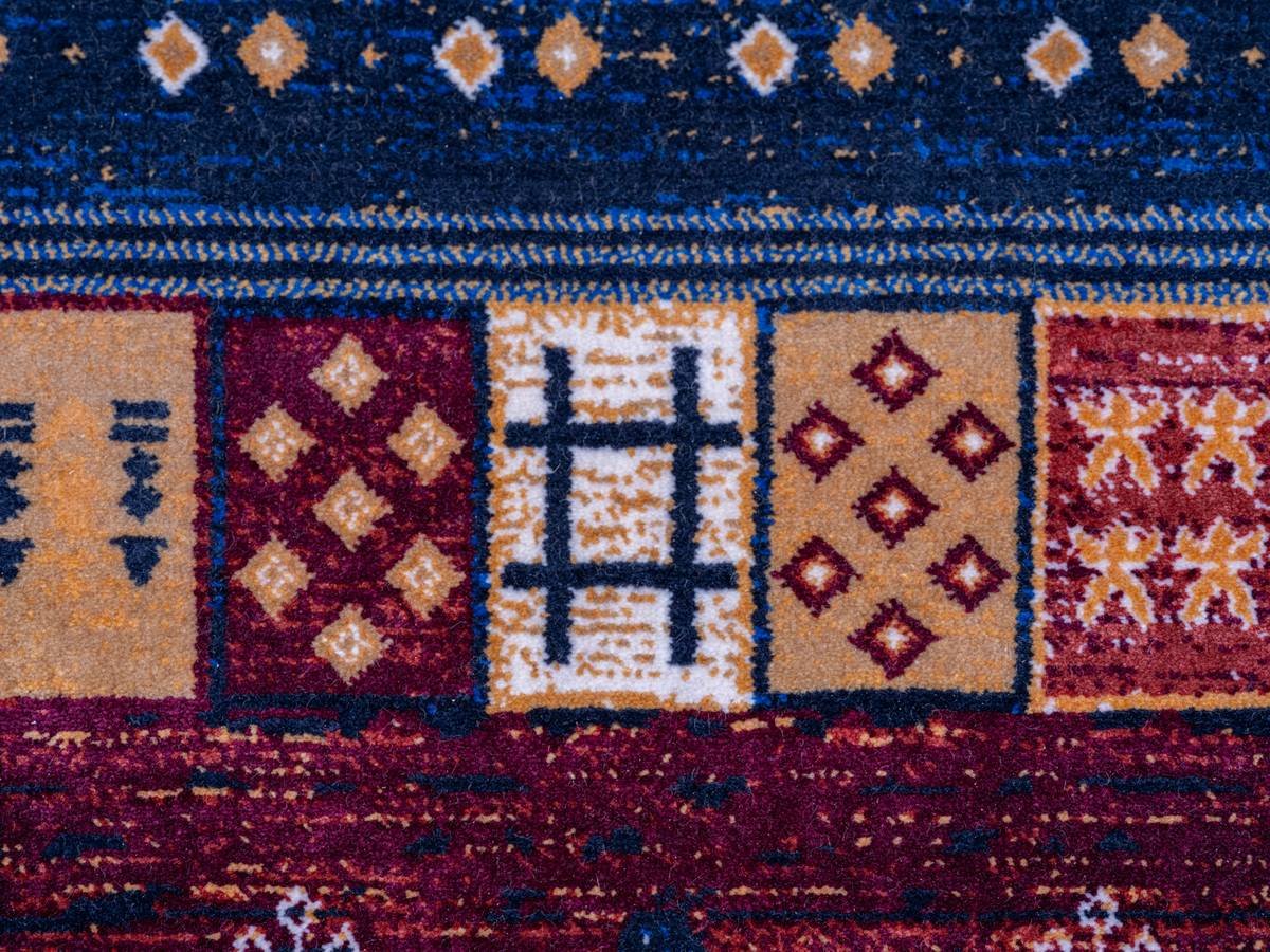 Living room with multi colored berber carpet resisting visible wear near entryway